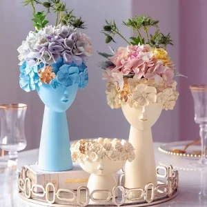 vase visage résine