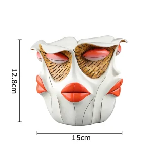 vase résine représentation visage